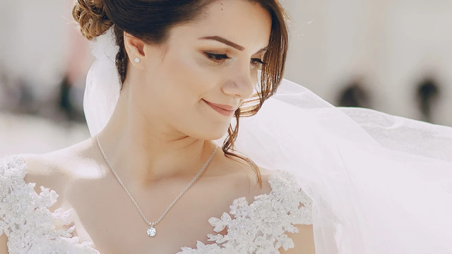 Woman Wearing Diamond Pendant