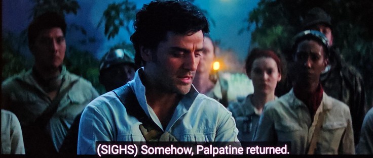 We're on a planet at dusk with green trees in the background behind a group of onlookers wearing khaki type REI camper outfits. Standing front and center is Poe Dameron from those Star Wars movies. He's also wearing khaki camping stuff, and looks very disappointed in something. Closed caption reads, "(SIGHS) Somehow, Palpatine returned."