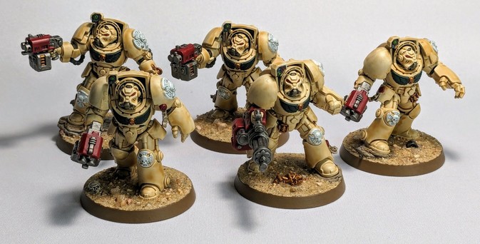 Five Space Marine Terminators painted in the Dark Angels Deathwing theme of bone-colored armor.