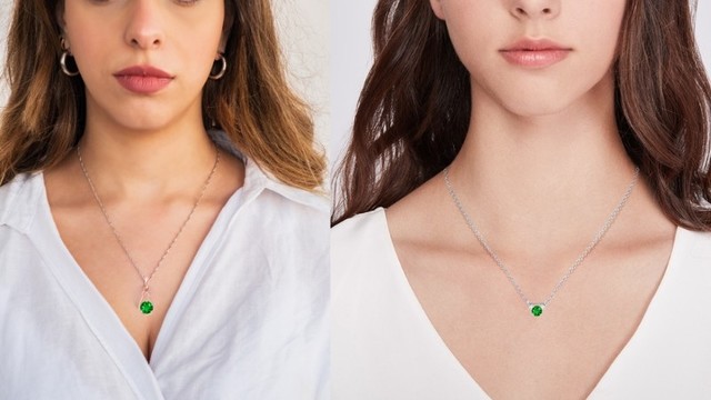 Woman Wearing Emerald Pendant
