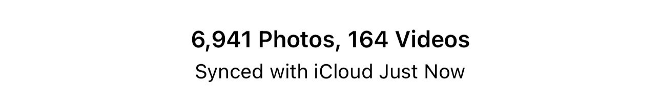A iOS photo library text notification displaying 