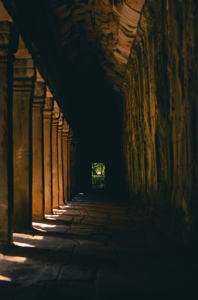 Another hallway at Ta Prohm with minimal light creates beautiful textures and colors in the shadows and highlights. 