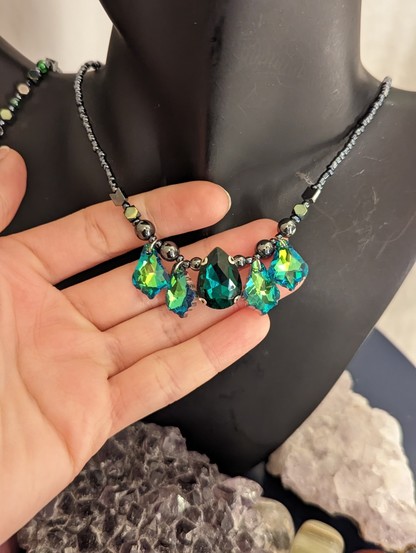 Photo of green grey necklace with green glass pendants and hematite styled beads
Green drop mid pendant and 4 green baroque pendants