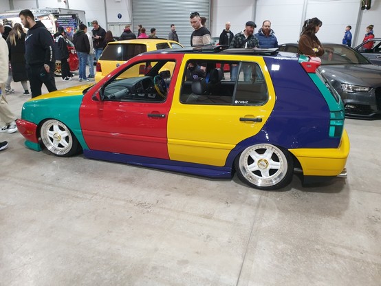 A VW Golf Harlequin with messed-about with suspension.