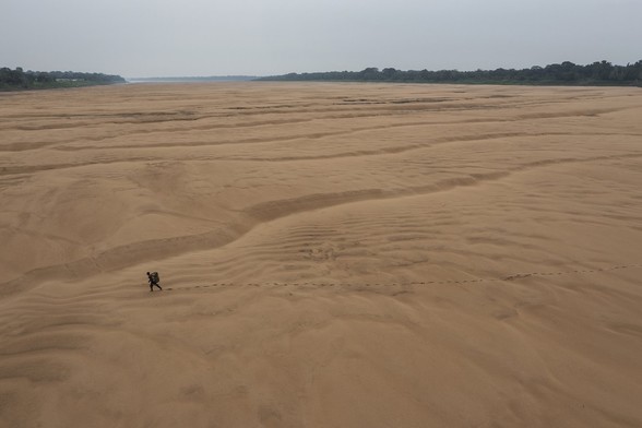 In 2023, the Amazon experienced its most intense drought since recordkeeping began. The drought disproportionately impacted Indigenous, rural, and river communities. While Porto Praia has no road access and is normally reachable only by river, the drought meant that residents had to walk for kilometers along the dry riverbed to reach their homes, capturing the gravity of the global environmental crisis and drought in the Amazon in one moment.

Lalo de Almeida has spent a decade documenting environmental, social, and indigenous issues in the Amazon.