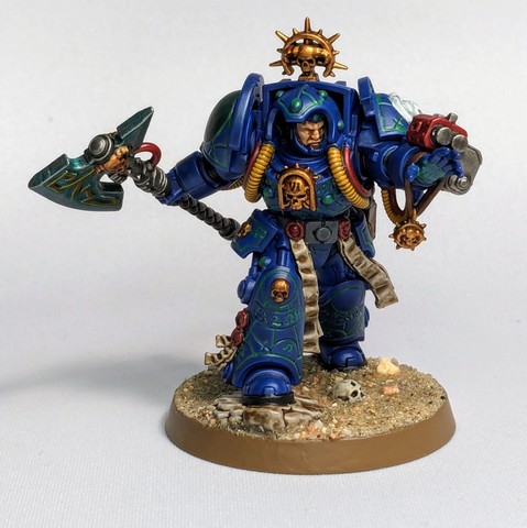 Librarian in blue Terminator armor with green highlights for Dark Angels colors.