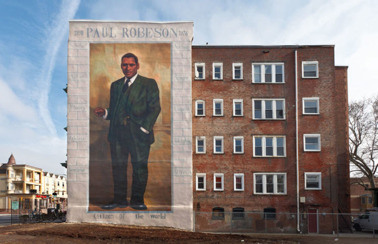 Photo: Paul Robeson mural in West Philadelphia -- photo by Steve Weinik; mural by Mural Arts Philadelphia