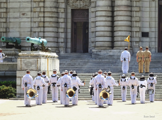 The Noon Meal Formation at the Annapolis Naval Academy is held weather permitting weekdays during the academic year and Monday through Saturday during Plebe Summer. Plebe Summer is the summer new midshipmen begin their four-year program. Here we see the USNA band leaving the Noon Meal Formation.