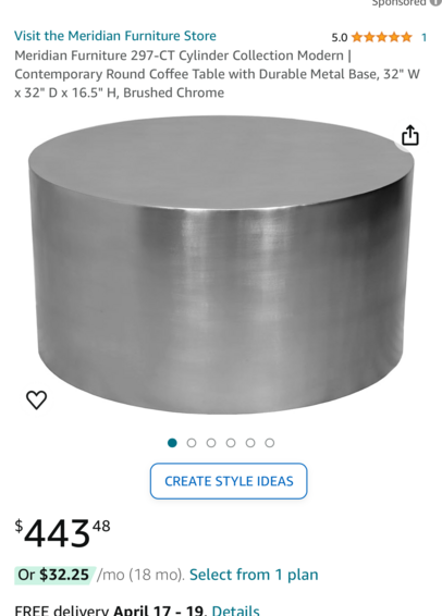 Amazon advert for a featureless grey cylinder that’s apparently made of brushed chrome and meant to be a coffee table for $443