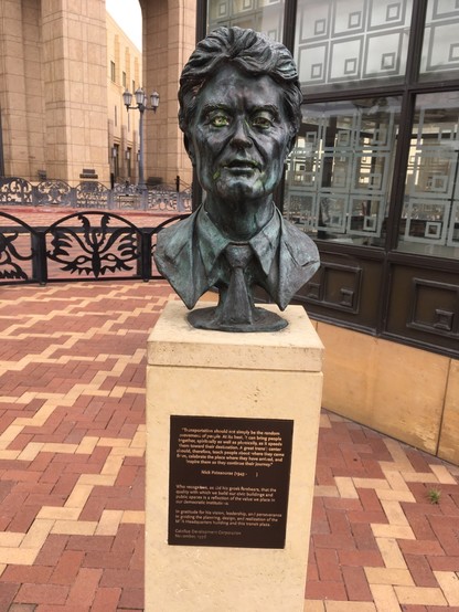 Bronze bust and plaque to Nick Patsaouras, urban planner and engineer after whom the bus plaza is named