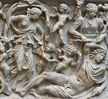 White marble relief depicting Selene in a peplos that leaves one breast bare, with her iconic lunar crescent on the brow. Her iconic cloak billows over her head. Several Erotes are present, one of whom is holding a burning torch in flight, symbolising the love for Endymion. Endymion lies asleep in nothing but a short cloak pinned over his shoulder.