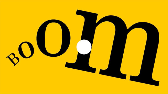 Screenshot from the Nothing Meet Ear (a) video showing a bright solid yellow background with huge, black, block-serif lettering spelling out B-O-O-M across the middle. There is a white circle in the direct center that reminds me of the hole in the middle of a vinyl record too.