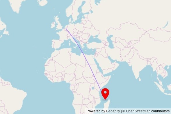 A map showing the great circle route from Arendonk in Belgium to a map pin at Église Notre-Dame de Fatima, Avenue M’Chindra Said, 96700 Kawéni, France