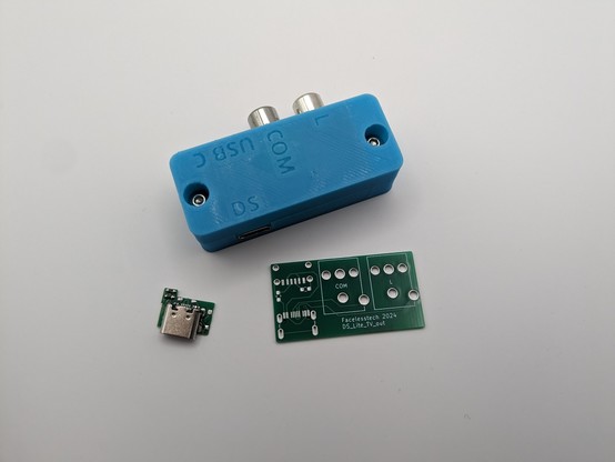 The USB C breakout box finished in a 3d printed shell also below it is the bare PCB and USB C ds lite adapter 
