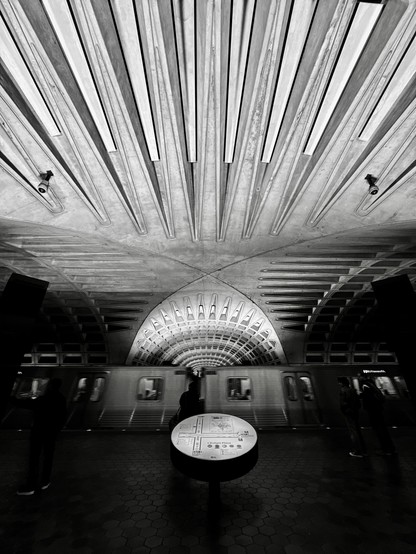 The vaulted arches of the L’Enfant Plaza Metro station in black and white