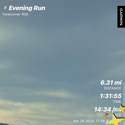 A screenshot of a Garmin running tracker displaying data for an evening run, including distance (6.3 miles), time 1 hr, 31min, 55 sec), pace (14 min 34 sec), and date (apr 29, 2024 17:39) against a backdrop of a cloudy sky. (10.1k with a pace of 9 min per km if I can math today)