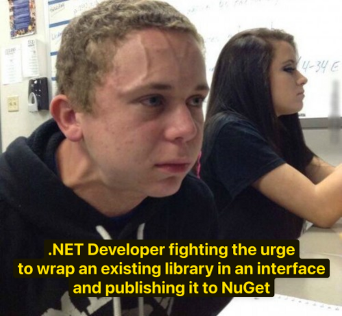 text: “.NET Developer fighting the urge to wrap an existing library in an interface and publishing it to NuGet.” (Meme: a boy with veins bulging out of their head).