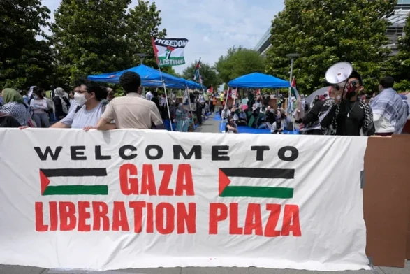 People gather to protest against Israel’s war on Gaza at the University of Texas at Dallas, on Wednesday [LM Otero/AP Photo]