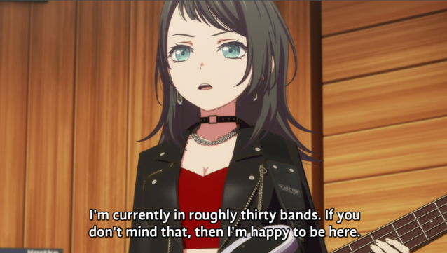 A stylish chick with a red top, a black leather jacket, an adjustable choker, and medium dark hair.

The subtitles read "I'm currently in roughly thirty bands. If you don't mind that, then I'm happy to be here."