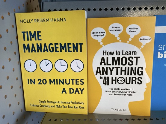 A photo of two books on time management.
