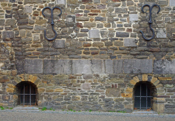 Small windows at street level to the crypt of the Saint Servatius church in Maastricht - The Netherlands