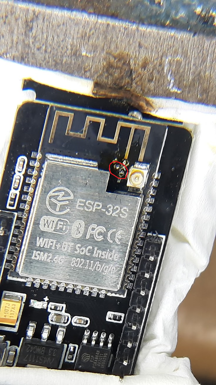 esp32 cam board closeup, with small resistor encircled