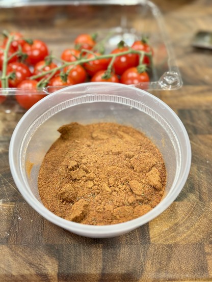 Powdered pizza spice in a container 