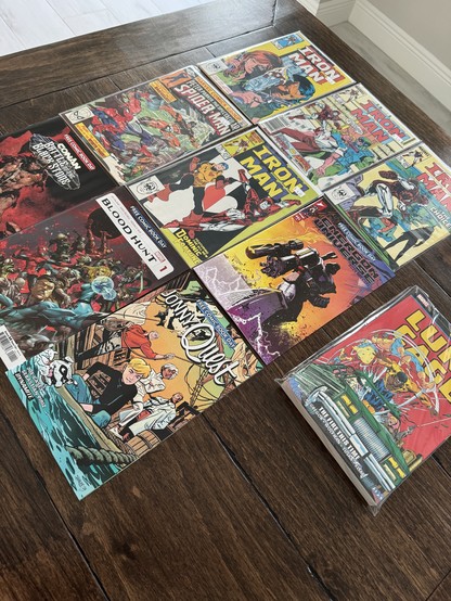 An assortment of comic books from Free Comic Book Day, including Jonny Quest, Conan, Blood Hunt, and the Energon Universe 2024 special.