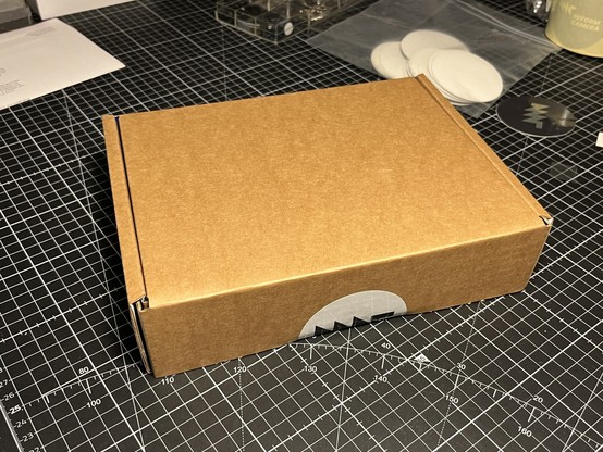 closed pocket reform box, minimalist, with mnt sticker closing it