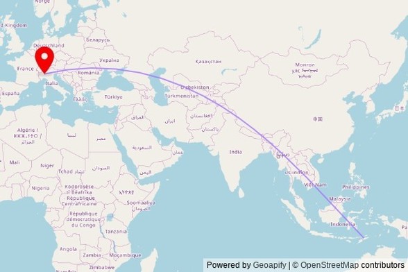A map showing the great circle route from Dili in Timor-Leste to a map pin at Chiesa parrocchiale dei Santi Giacomo e Filippo, Via San Martino, 2, 20010 Cornaredo MI, Italy