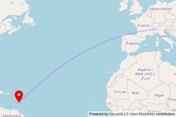 A map showing the great circle route from Cornaredo in Italy to a map pin at Minor Basilica of the Immaculate Conception, Micoud Street, Castries, Saint Lucia