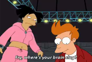 GIF clip from “Futurama”:
Amy (brown skinned femme with short black hair in pink sweatsuit) points at Fry (light skinned masc with shirt spiky blonde hair) and says “Fry, where’s your brain slug?”
Shot cuts back to show 5 characters standing in a boxing style ring and the Professor (light skinned masc bald wearing a lab coat) picking up a flaccid green object
Zoom to professor stroking limp green jello-like creature with one eye
“Poor little guys starved to death”