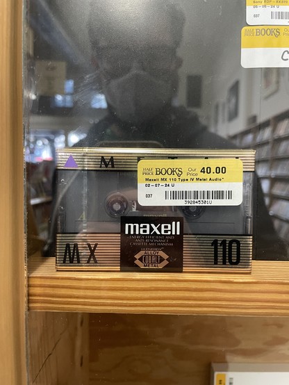 A single blank cassette tape in original packaging at Half Price Books 