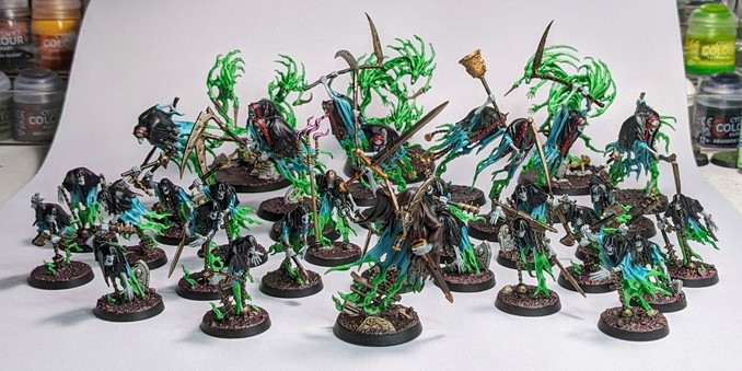 Nighthaunt army painted with bright blues and greens.