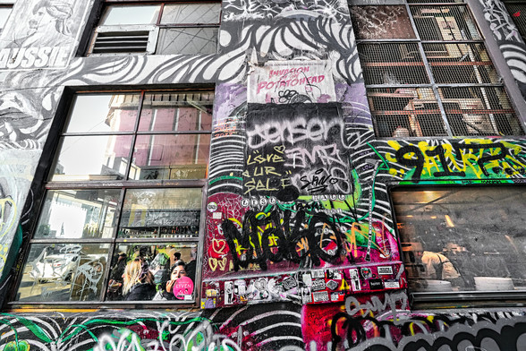 Hosier Lane is a laneway in the central business district of Melbourne, Victoria, Australia. Located on the CBD's southern edge, it extends between Flinders Street and Flinders Lane, and opens opposite the Atrium at Federation Square.