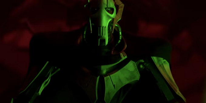 an image of him standing above the viewer, the background red and black clouds, green light on him, he is seen from the chest up, looking down at the viewer 