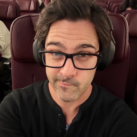 It’s me, in an airplane seat.