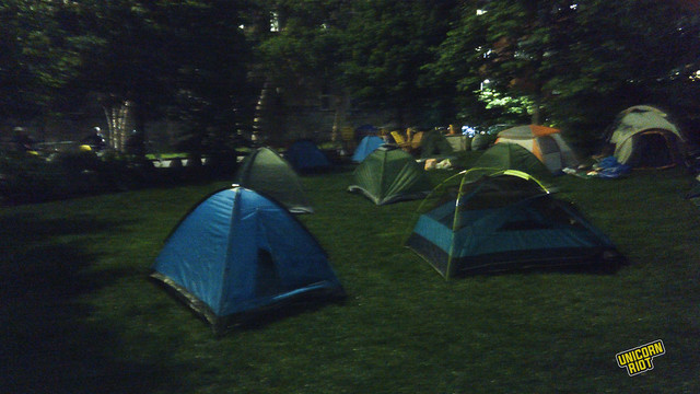 Nearly a dozen tents at night