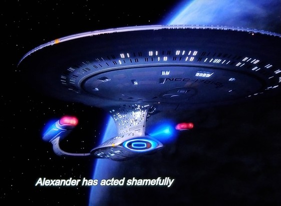 TNG scene. We're floating in space, orbiting a planet that is dark, and see the Enterprise D beautifully centered with glowing red and blue nacelles. Closed caption reads, "Alexander has acted shamefully"