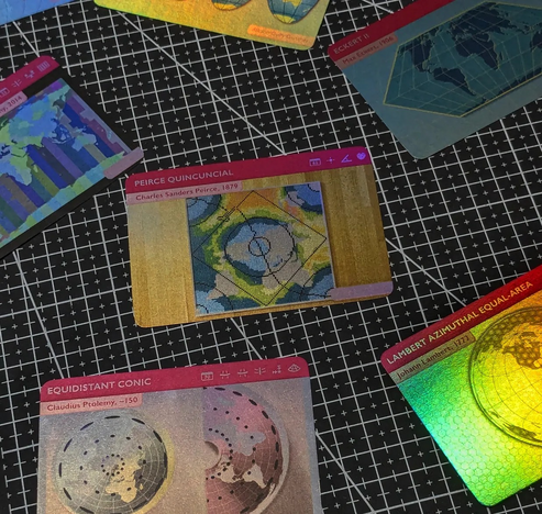A set of holofoil cards from The Projection Collection showing different map projections.
