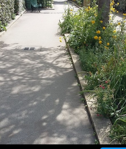 Footpath through a stretch of park in Paris located atop an old acquaduct.