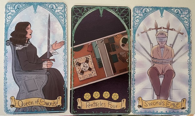 3 cards from a good omens tarot deck. 