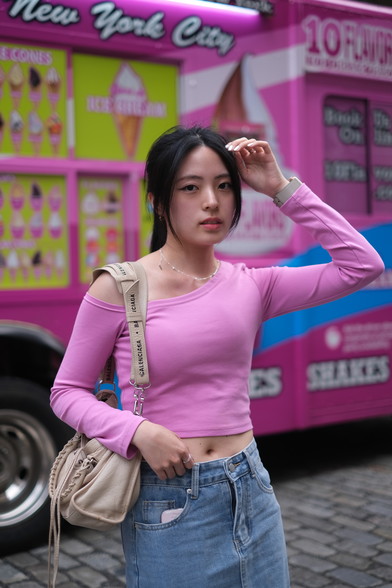 girl in pink top by ice cream truck