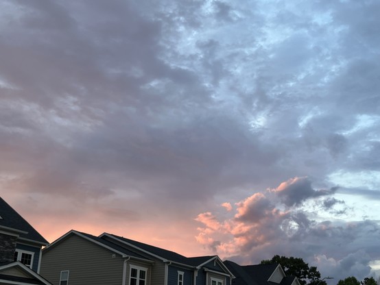 The clouds here reflect the scarlet light of the setting sun. The lumps of the clouds are very detailed. I'd have a REALLY hard time replicating them if I tried to draw something like this. Clouds are INCREDIBLE like that...nature's paintings, always a new one every single second.