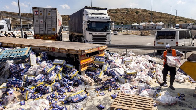 Trashed aid trucks