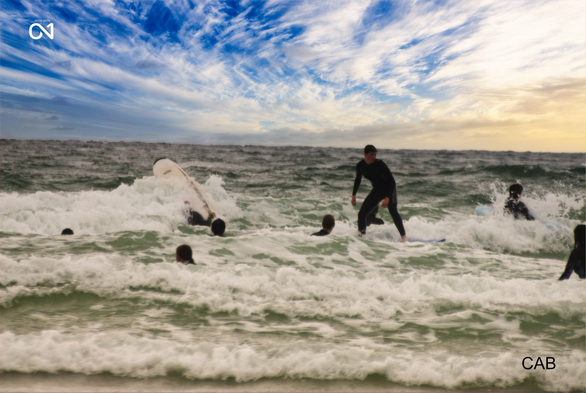 Surfers Surfing Cornwall Port Isaac