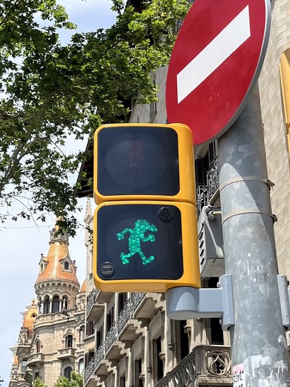 Traffic light in Barcelona, Spain (Passeig de Gràcia / Ronda de Sant Pere) with the outline of Mortadelo (from Mortadelo y Filemón, by Francisco Ibáñez)