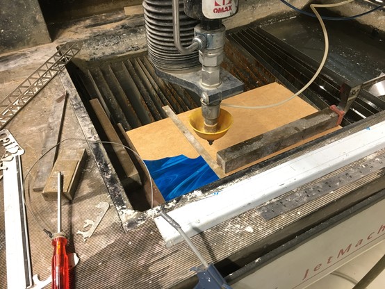 Blue glass, placed in waterjet.
