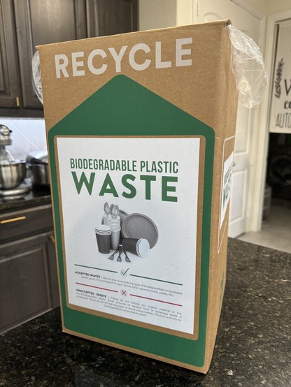 An empty box that I can fill up with biodegradable plastic for recycling.