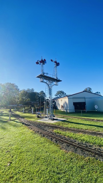 Railroad signal tower with two semaphore signals 